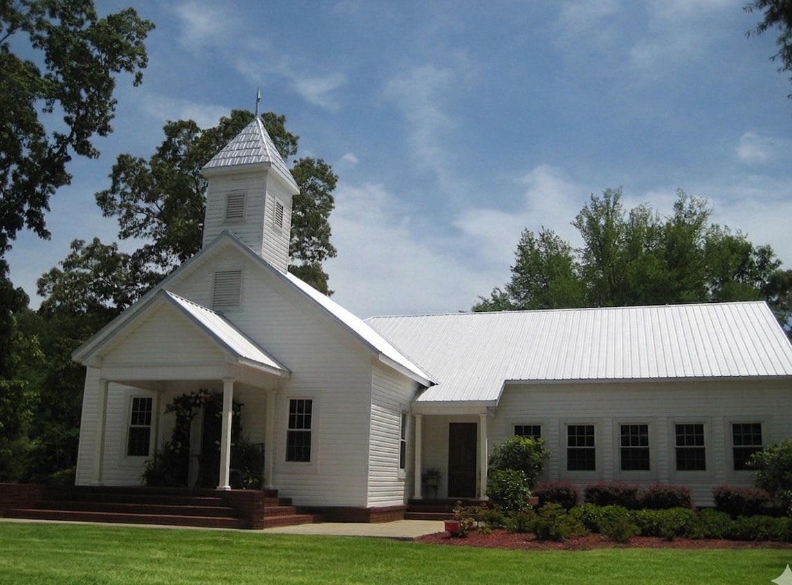 Silver Run Chapel exterior — white historic schoolhouse