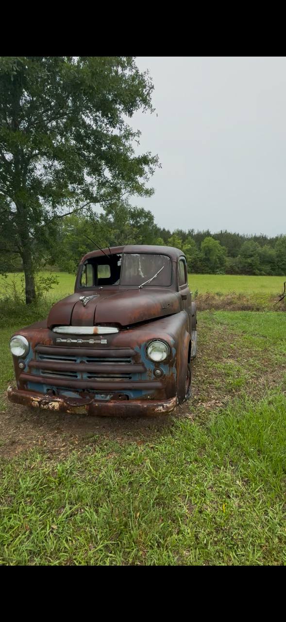 Vintage Dodge truck on the property